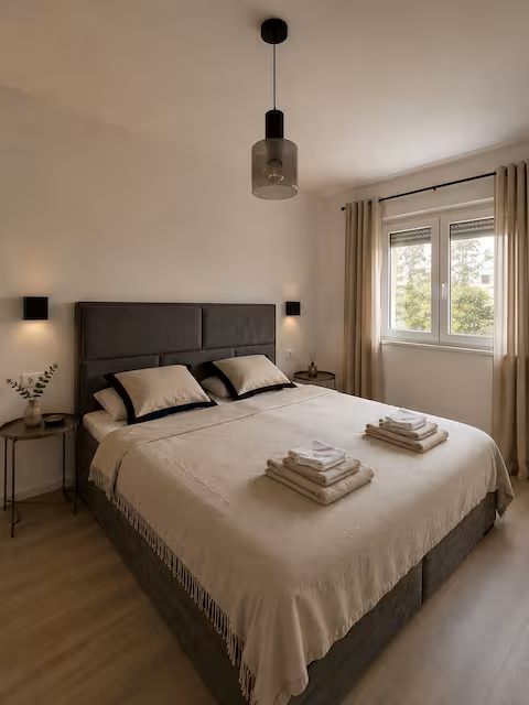 Second bedroom with double bed and window
